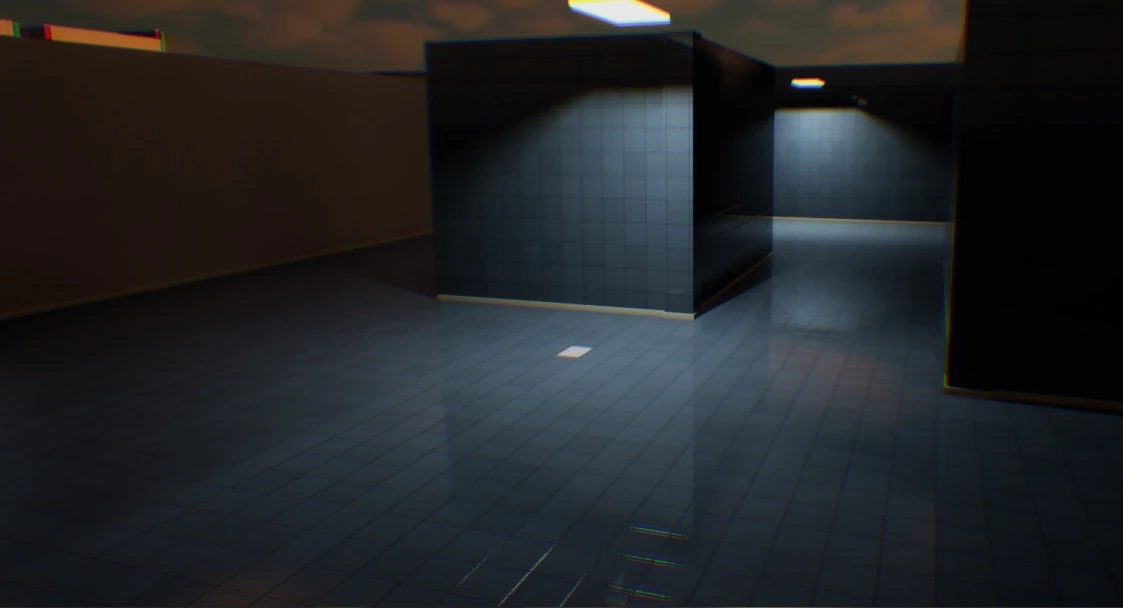 Dark office environment with tiled partitions and isolated pools of overhead light.